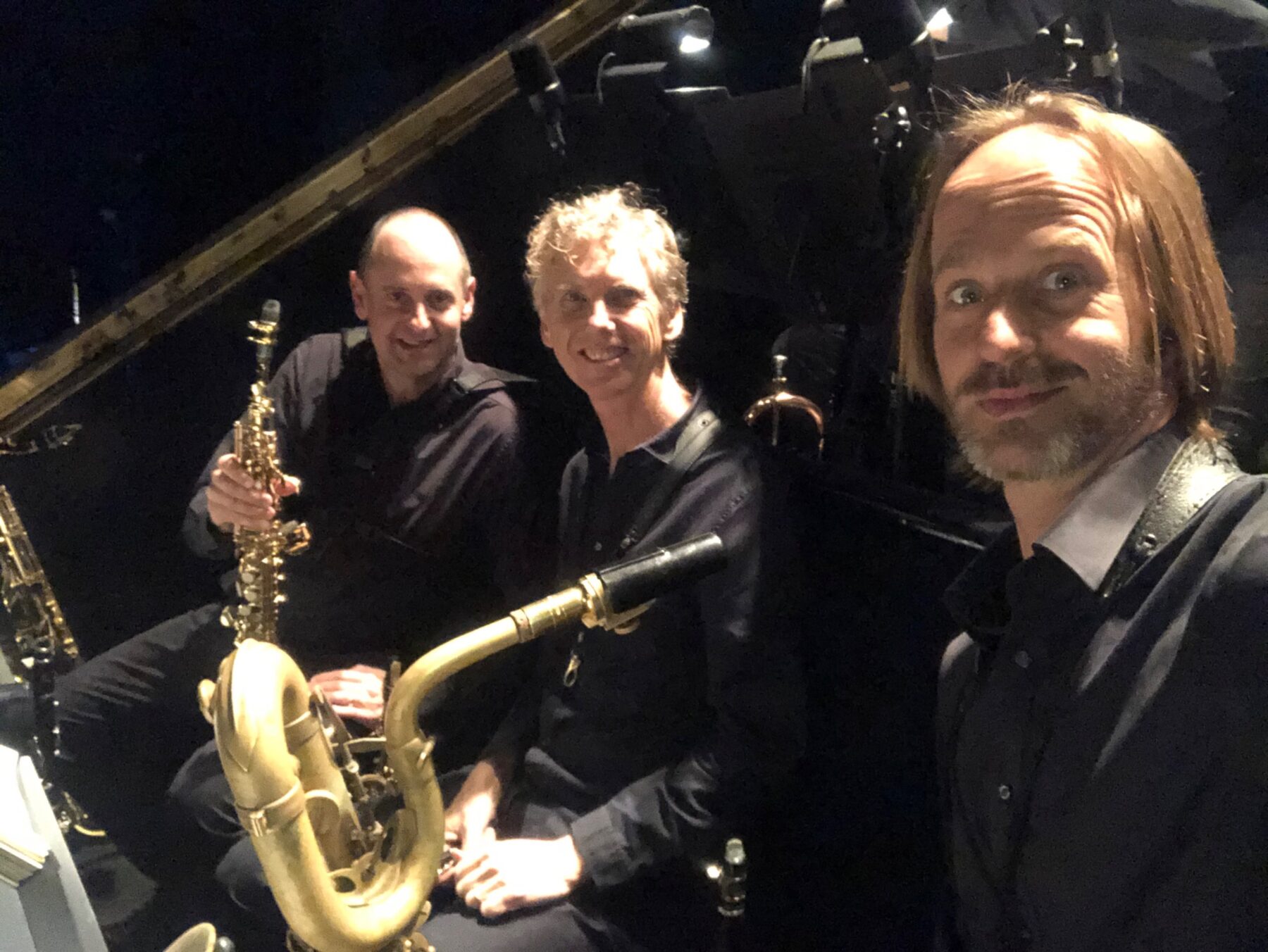 Remco Keijzer with fellow saxophonists in a theatre orchestra pit